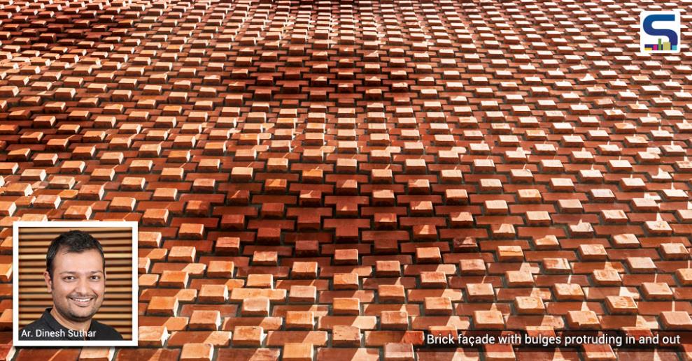 Design Work Group completed a family home in the Indian port city of Surat, which features a gently undulating brick facade that offers shade from the sun.