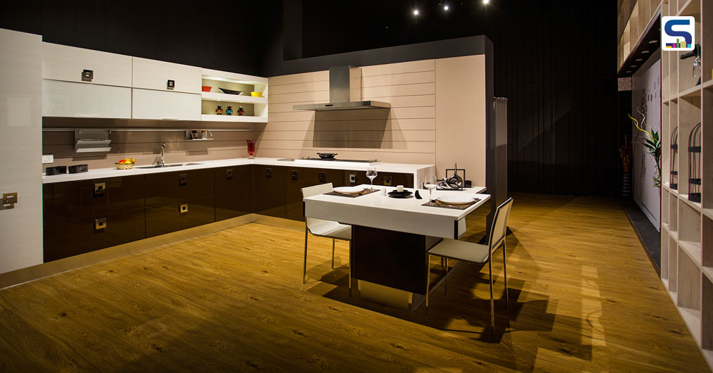 Color scheme:- Color scheme is selected to compliment the furniture and display area. Texture of wood and simplicity of black color features richness and depth. The dark colour with a play of light serves as the contrast to the vibrancy elsewhere. False ceiling is done only to conceal the wiring and services and that too painted black so as to concentrate only on display area and ceiling does not distract anyone.