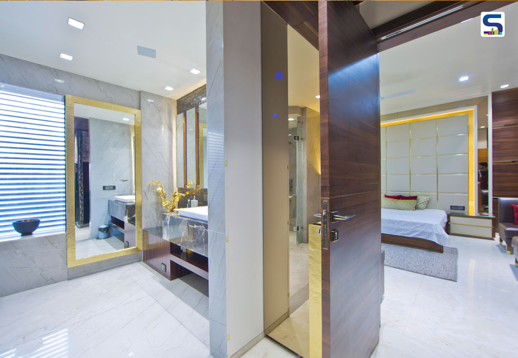 For the daughter’s bathroom, the parent’s princess, a pristine onyx stone was chosen in shades of honey. The reflection in this stone is so clear that it feels like one is walking off the floor. Pattern in grey and white hues add a more contemporary and up-to-date character to this space. The round mirrors further the feminine temperament.