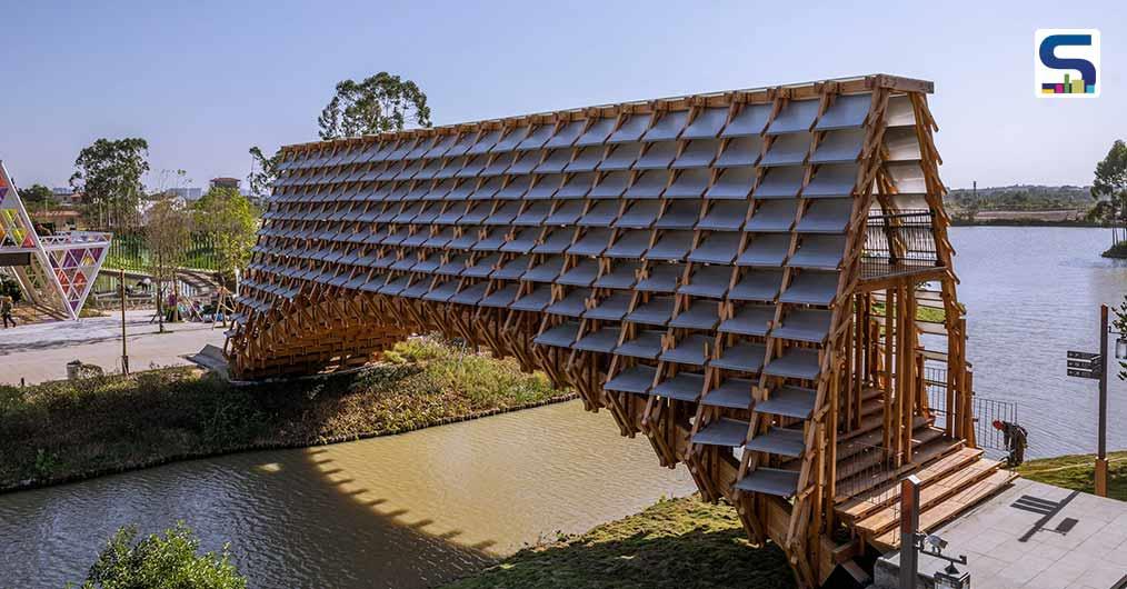 Chinese LUO Studio Uses Hundreds of Wooden Elements To Create This 25-meter-long Arched Timber Bridge in Gulou Waterfront