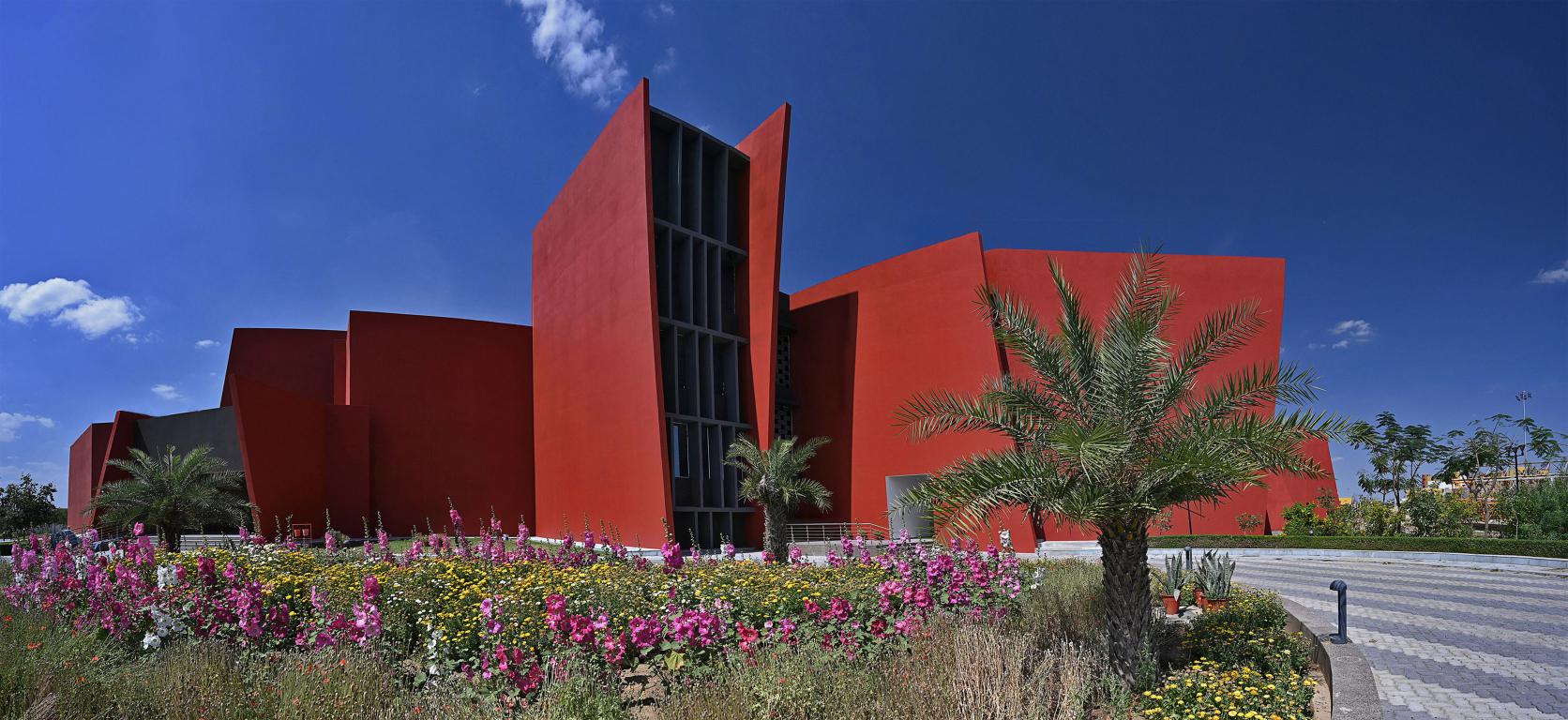 Sanjay Puri’s Rajasthan School Feature Red-coloured Angled Walls and Walkways