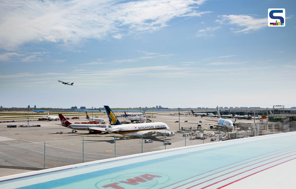 The TWA Hotel’s rooftop infinity pool and observation deck overlooks JFK’s bustling Runway 4 Left/22 Right.