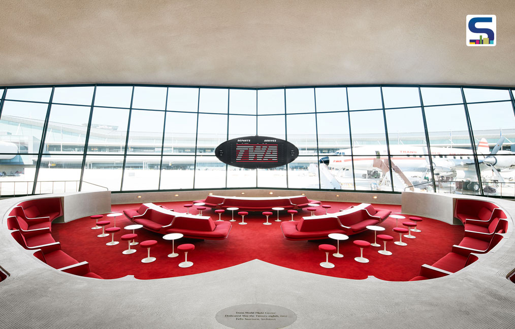 The Sunken Lounge at the TWA Hotel features its original Chili Pepper Red carpet and authentic penny tile.