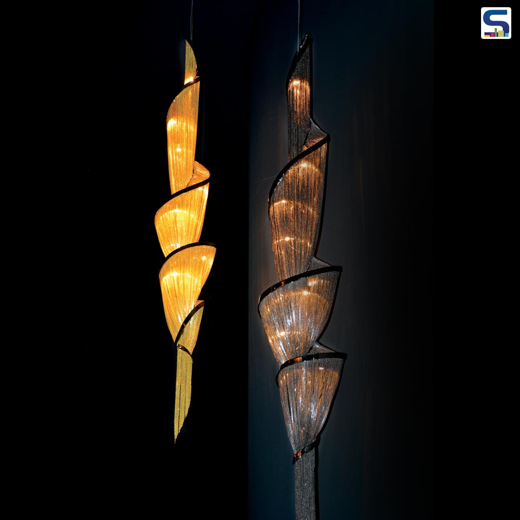 A light sculpture composed of curved, organic lines.