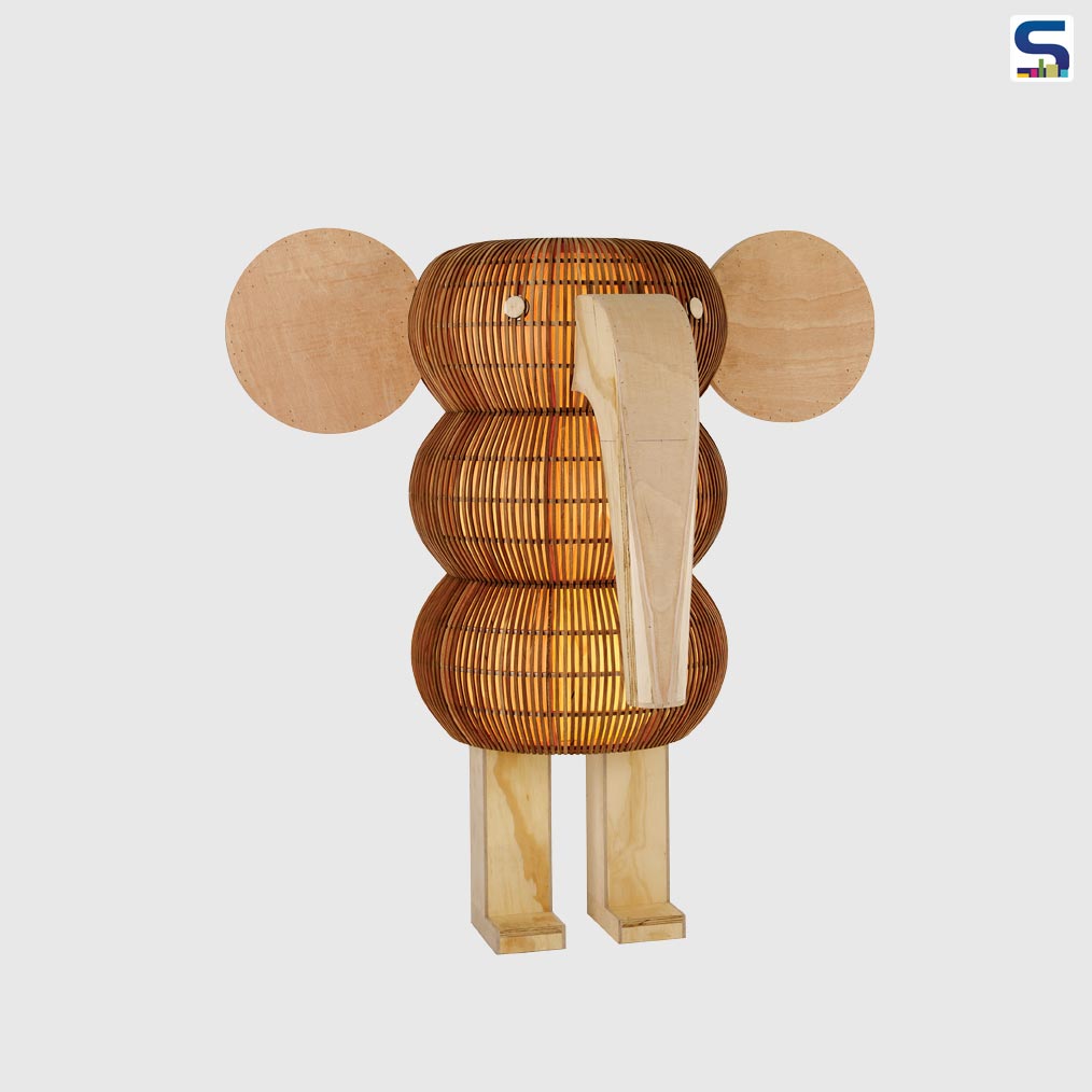 The uniquely designed lamp has a luminous heart, at the center, which is diffused through a natural wood veneer internal lining.