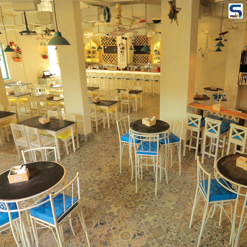 Hoppipola restaurant with  bright & sturdy floors designed by Spiro Sepro, Mumbai
