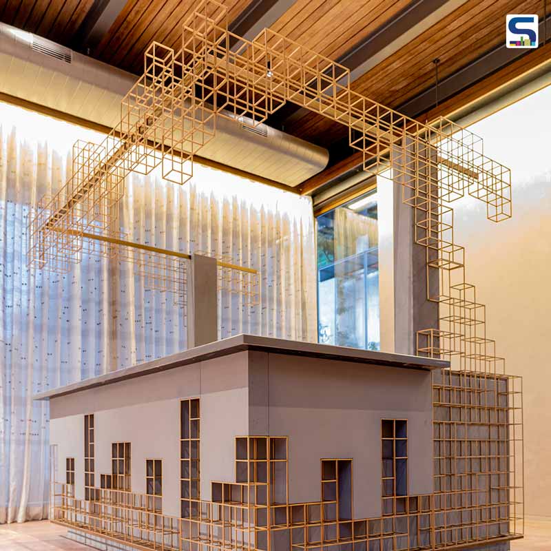 Jenga Inspired Concrete And Brass Bar by Faridabad Based Design Studio