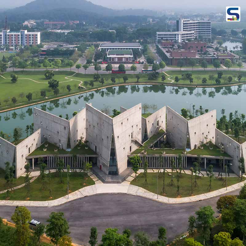 A Series of Six Concrete Open Book Shape Pavilions Connected to Create A Zig Zag Office in Vietnam | Vo Trong Nghia Architects