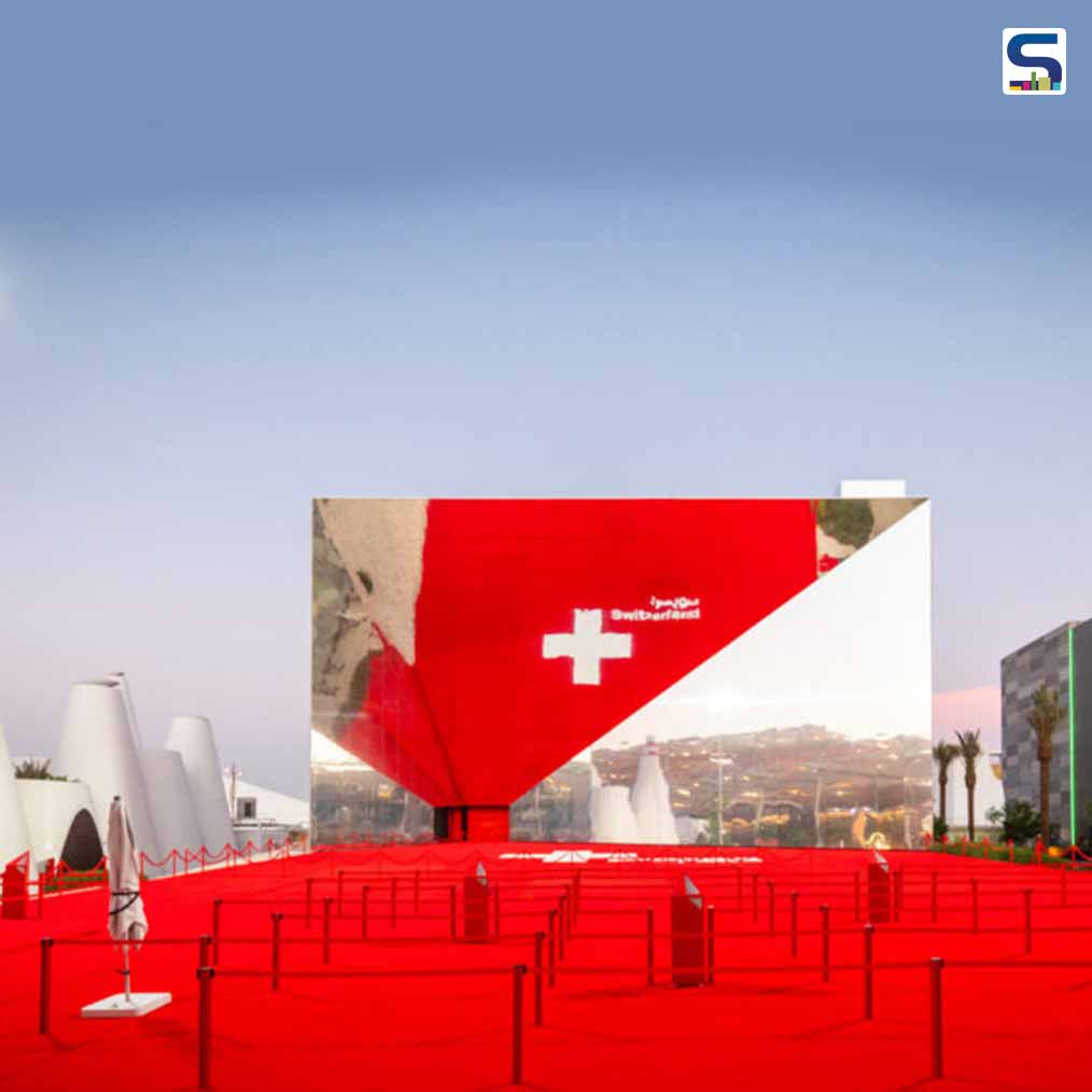 A Colossal Inclined Mirror Wraps The Front of The Swiss Pavilion at Dubai Expo | OOS