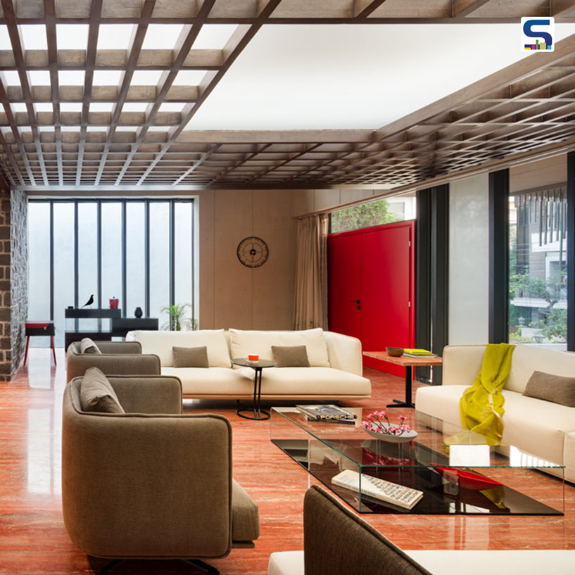 Built on vernacular design aspects, Hanging House in Noida flaunts Red Travertine and Kadappa Flooring that reinforces the overall rusticity of the home.