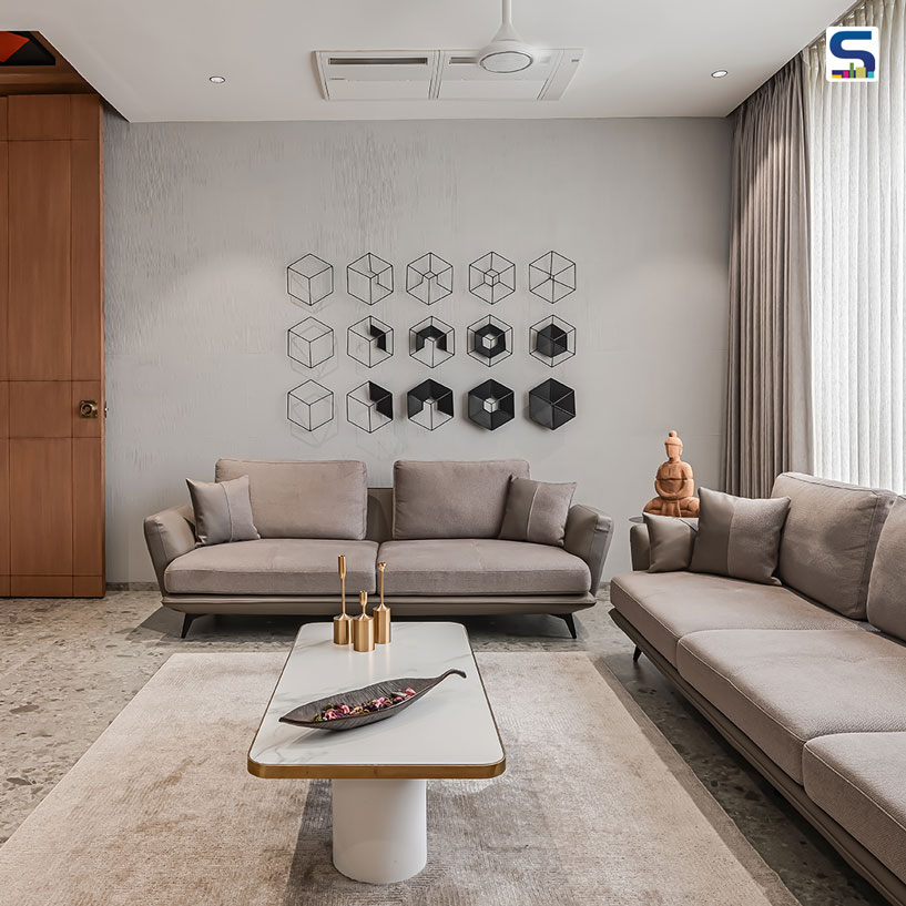 Wood Veneers With Grey Accents Give An Elegant Statement To this Modern Bungalow in Surat | Prangan Design