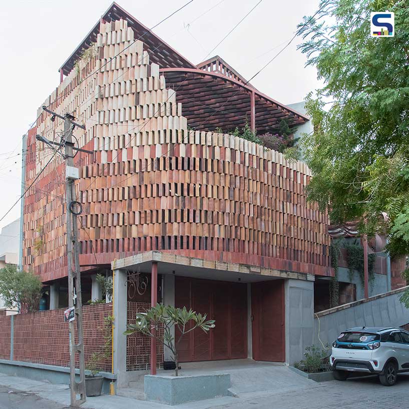 Terracotta, Concrete, and Warm Wood Accents Shape a Harmonious Environment in this Rajkot Home