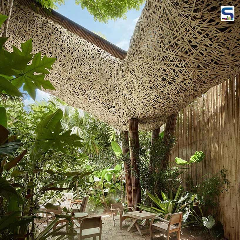 Bamboo Weaves Embrace Floating Walkways at Chinese Spa and Restaurant"
