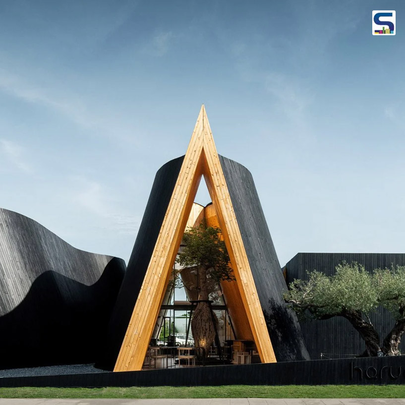 A Curved and Dynamic Cafe in Thailand, Featuring Unique Gabled Forms Clad in Blackened Wood | IDIN Architects